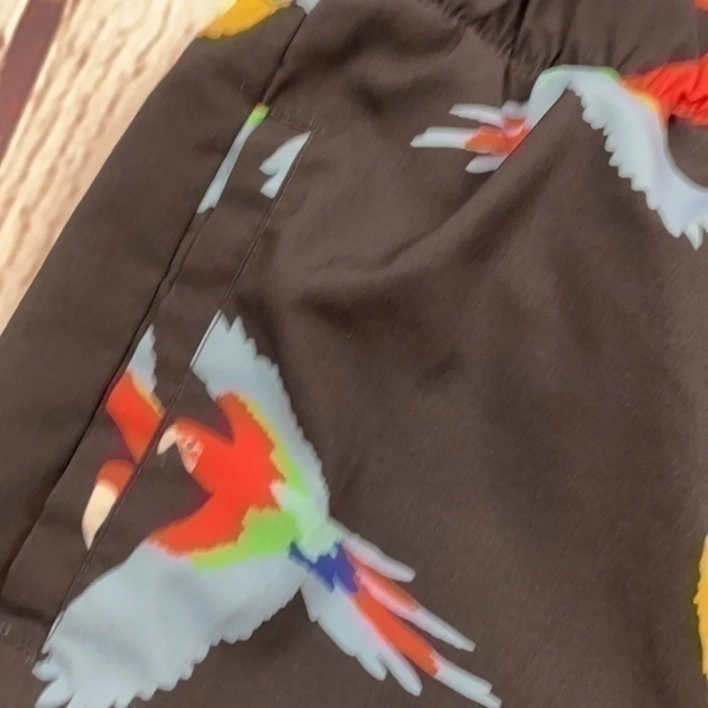 UEC men’s XL parrot swim trunks by No Retreat
